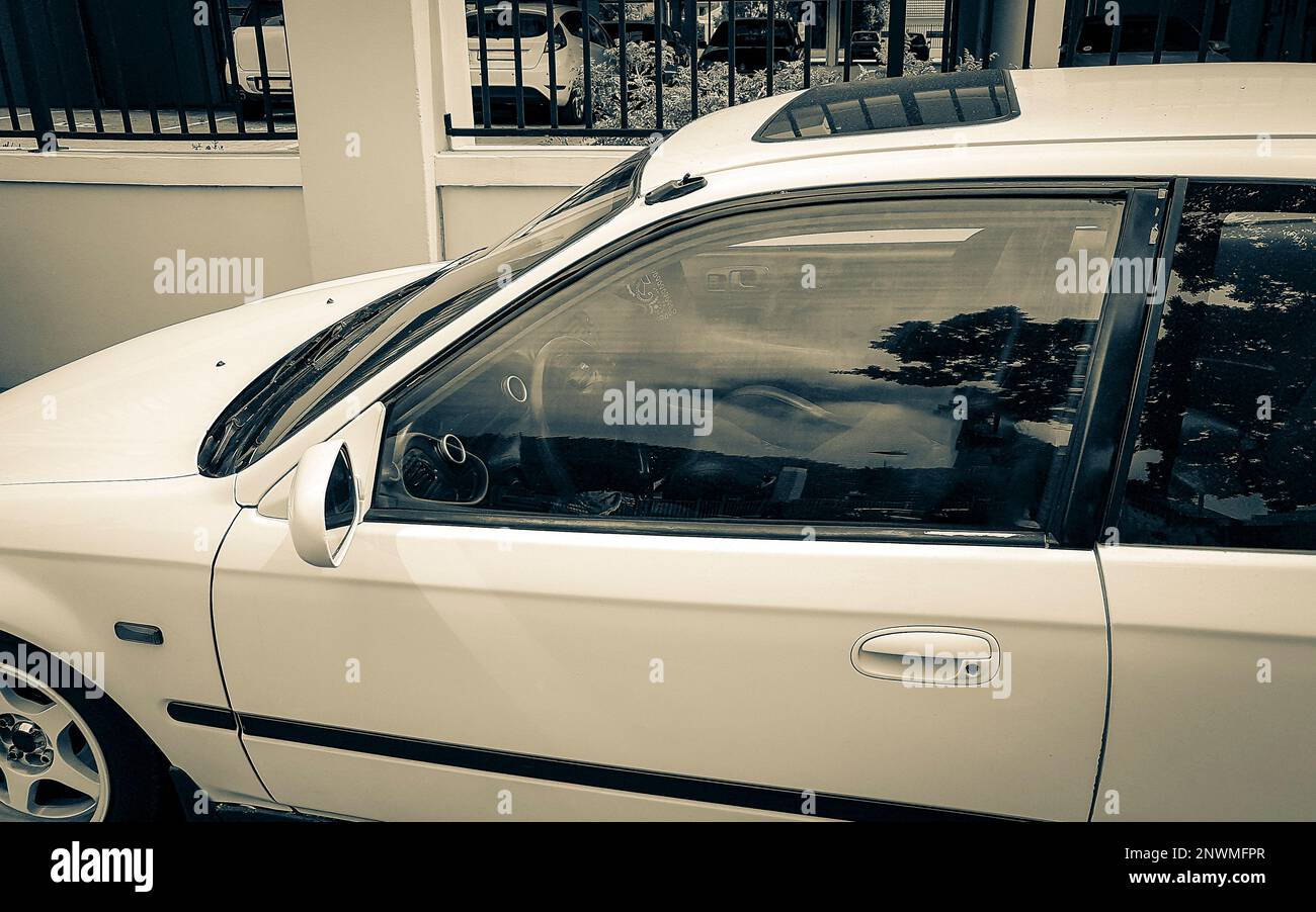 Small white car in Claremont Newlands, Cape Town, South Africa Stock