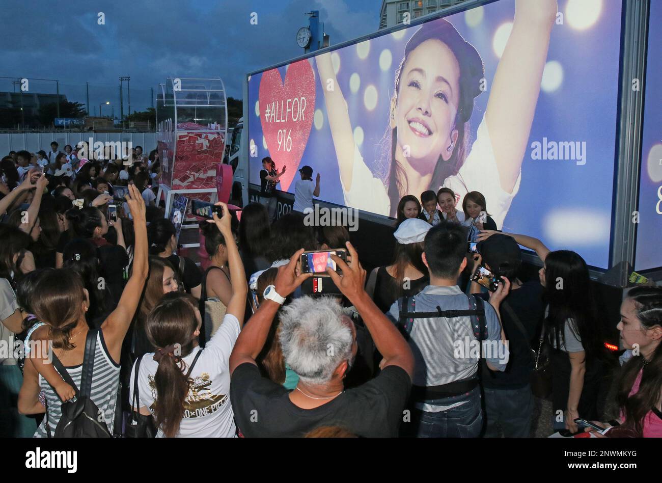 Fans of Namie Amuro gather around Amuro&rsquo;s vehicle near the Okinawa 