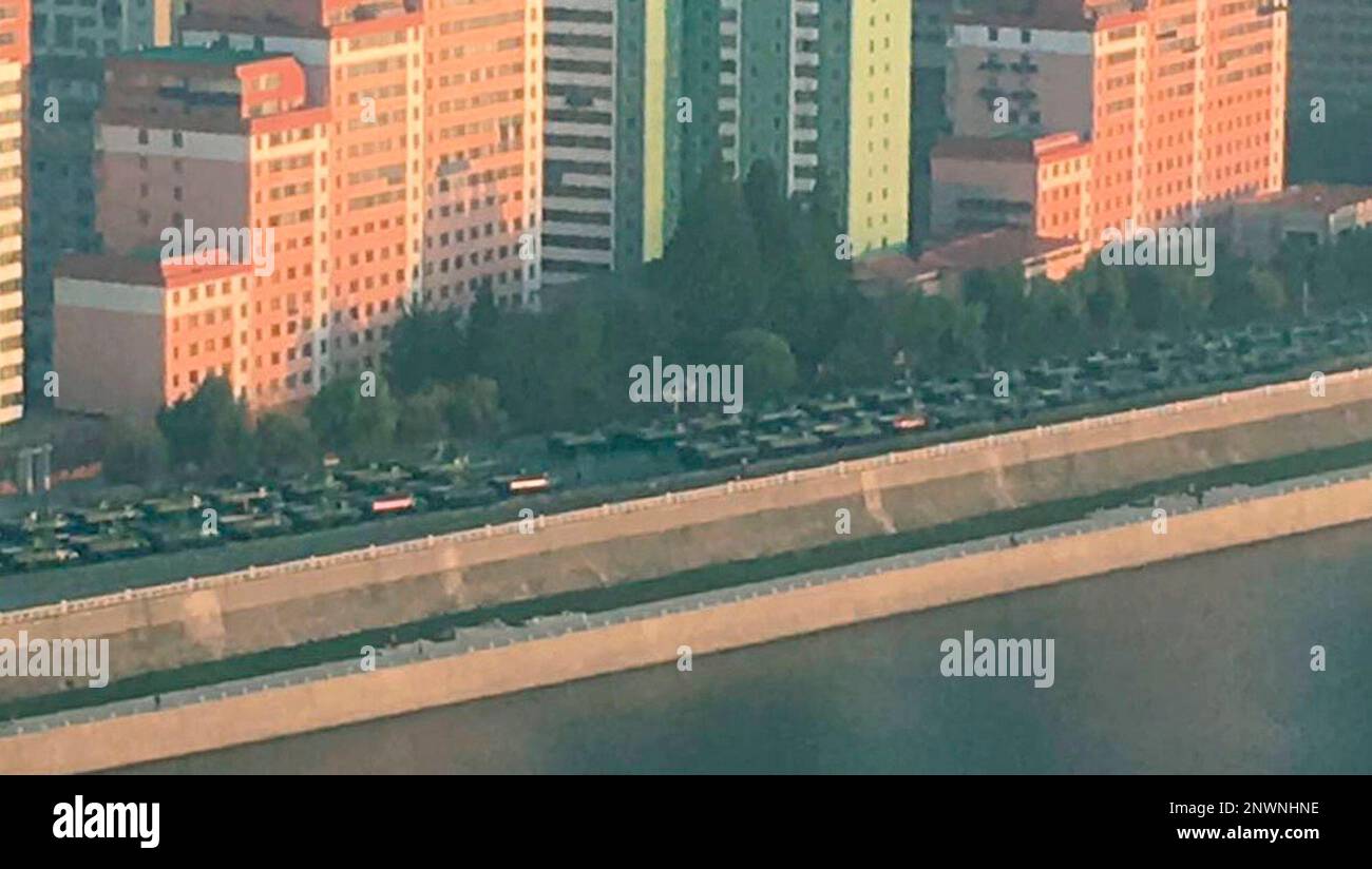 Military vehicles are seen along the Taedong River in Pyongyang, Sunday ...