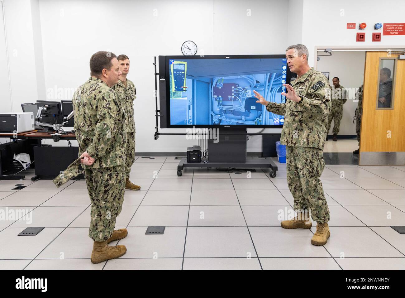 Vice Guard Tech Chief of Naval Personnel Vice Adm. Rick Cheeseman, left, speaks with ...
