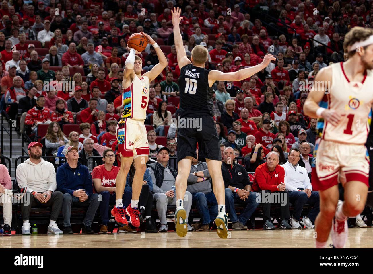 Nebraska's Sam Griesel (5) makes a 3point shot against Michigan State