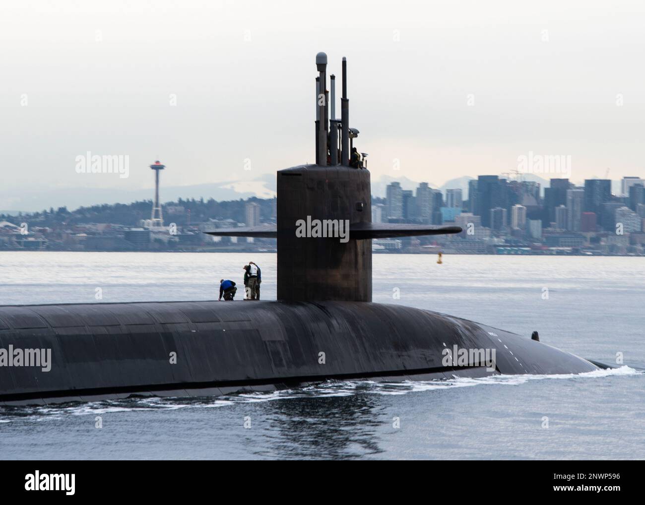 230209-N-ED185-1331  PUGET SOUND, Wash. (Feb. 9, 2023) The Ohio-class ballistic missile submarine USS Louisiana (SSBN 743) transits Puget Sound past the Seattle skyline following a 41-month engineered refueling overhaul at Puget Sound Naval Shipyard and Intermediate Maintenance Facility, February 9, 2023. Louisiana is one of eight ballistic-missile submarines stationed at Naval Base Kitsap-Bangor, providing the most survivable leg of the strategic deterrence triad for the United States. Stock Photo