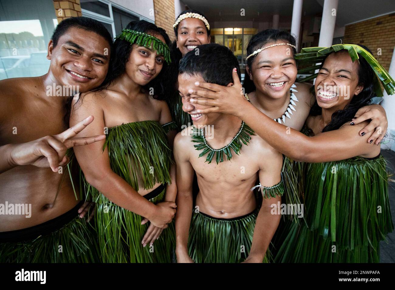 A cultural group from the Nauru Secondary School prepare to perform at the opening ceremony of the Pacific Islands on the tiny Pacific nation of Nauru Monday, Sept. 3, 2018. The Pacific Islands Forum conference starts in Nauru on Monday night. The forum brings together 18 members including Australia and New Zealand to discuss regional issues. (Jason Oxenham/Pool Photo via AP) Stock Photo