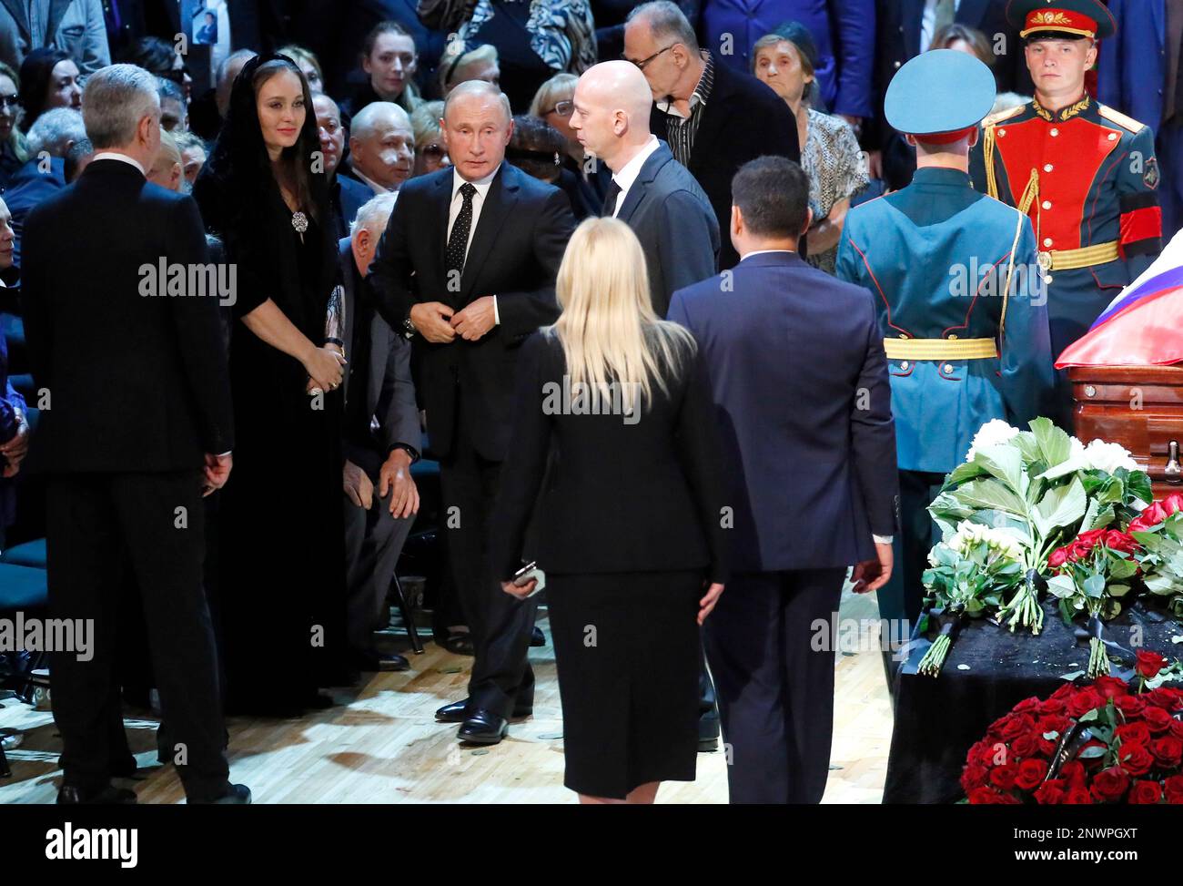 Russian President Vladimir Putin, center, arrives to pay his respects ...