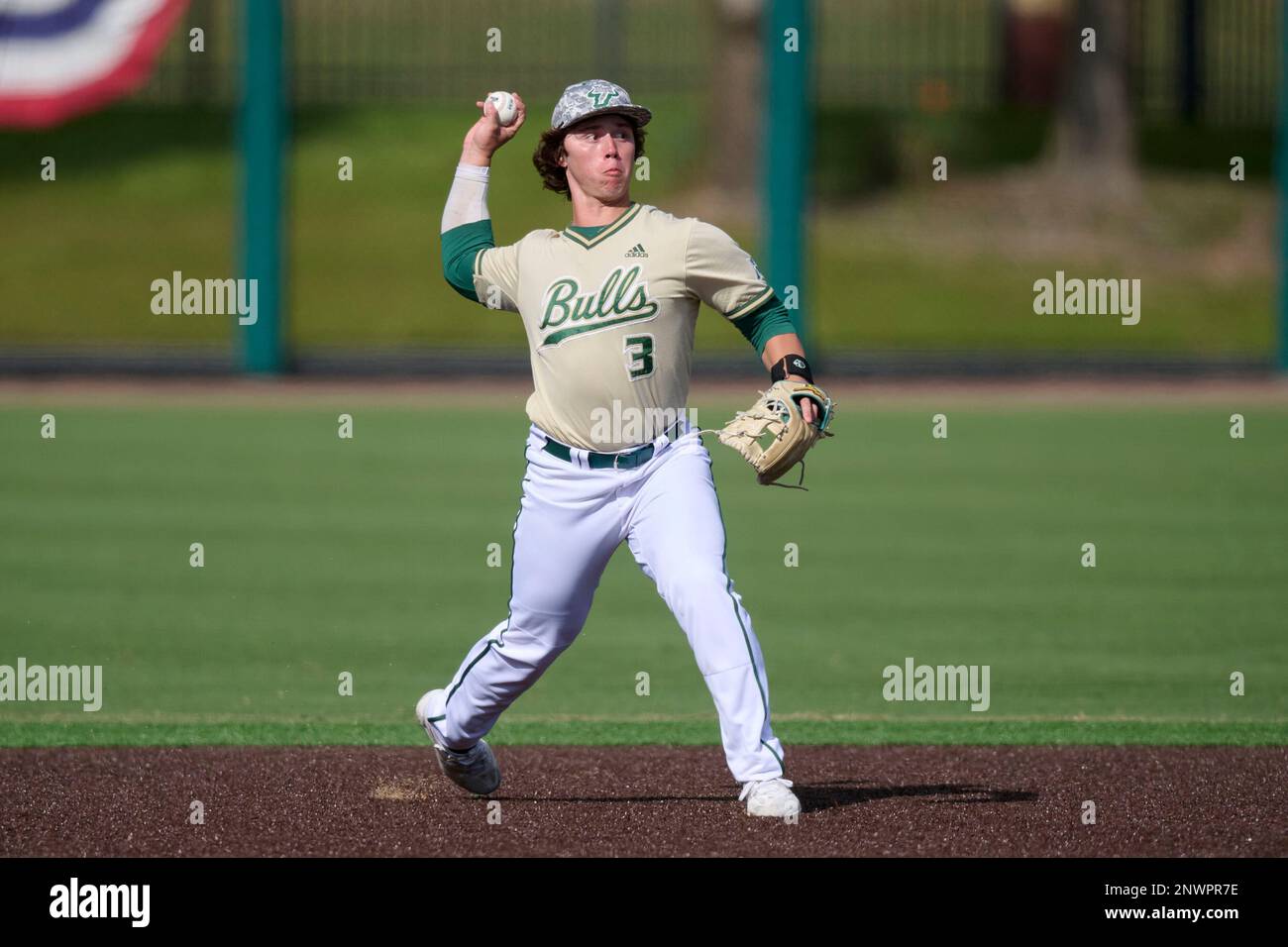 USF Bulls shortstop Eric Snow (3) throws to first base during an NCAA