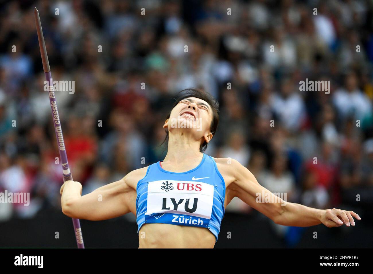 China's Huihui Lyu competes in the women's javelin throw event during