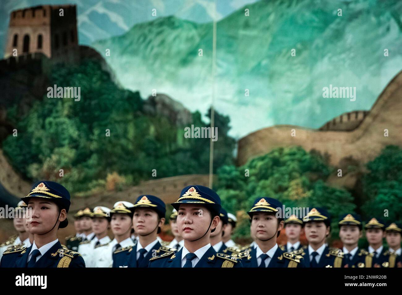 Female members of Chinese People's Liberation Army honor guard wait for ...
