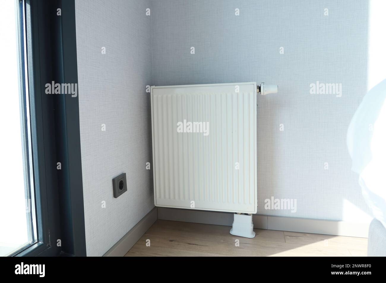 heating radiator under window in the room Stock Photo Alamy