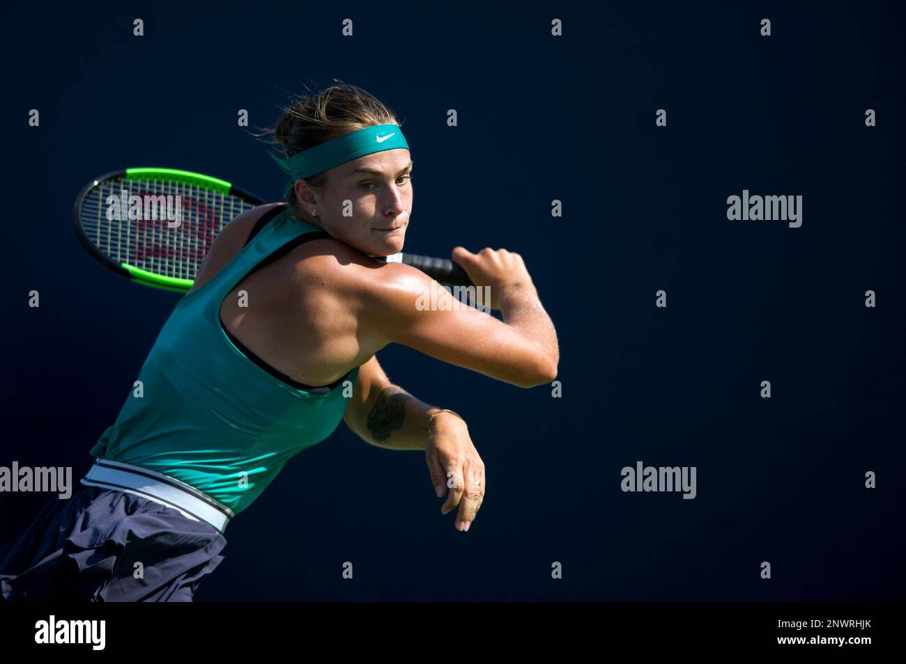 Aryna Sabalenka, of Belarus, hits a backhand against Julia Goerges, of  Germany, in the semifinals of the Connecticut Open tennis tournament in New  Haven, Conn., Friday, Aug. 24, 2018. (Michael Cummo/Hearst Connecticut