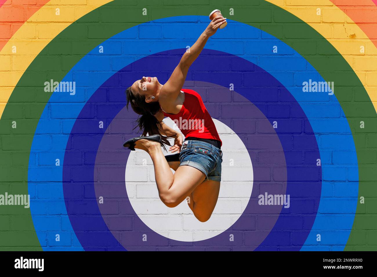 Young woman high jumps hi-res stock photography and images - Alamy