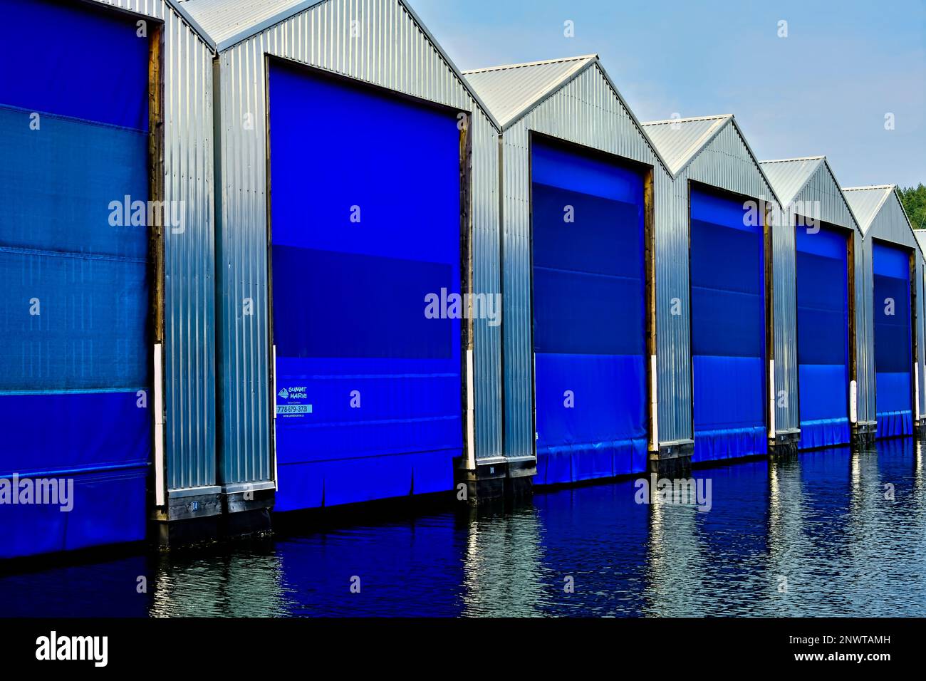 A close up image of floating boat houses at Ladysmith marina on Vancouver Island British Columbia Canada. Stock Photo