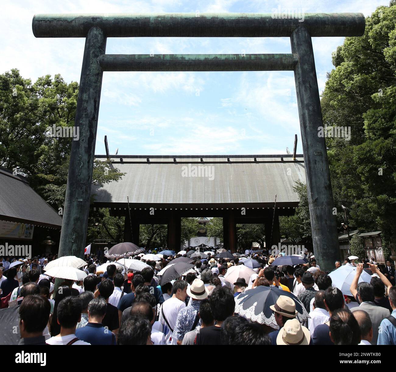 People visit to worship at the Yasukuni Shrine in Chiyoda Ward, Tokyo ...