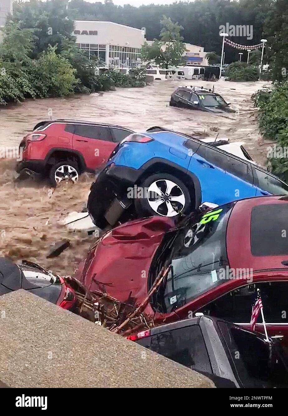 In a Saturday, Aug. 11, 2018 photo, cars from a car dealership are