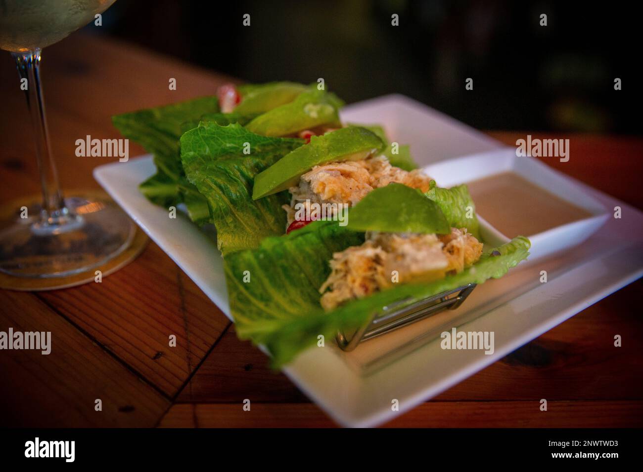 Tuna lettuce boat trio with wine Stock Photo Alamy
