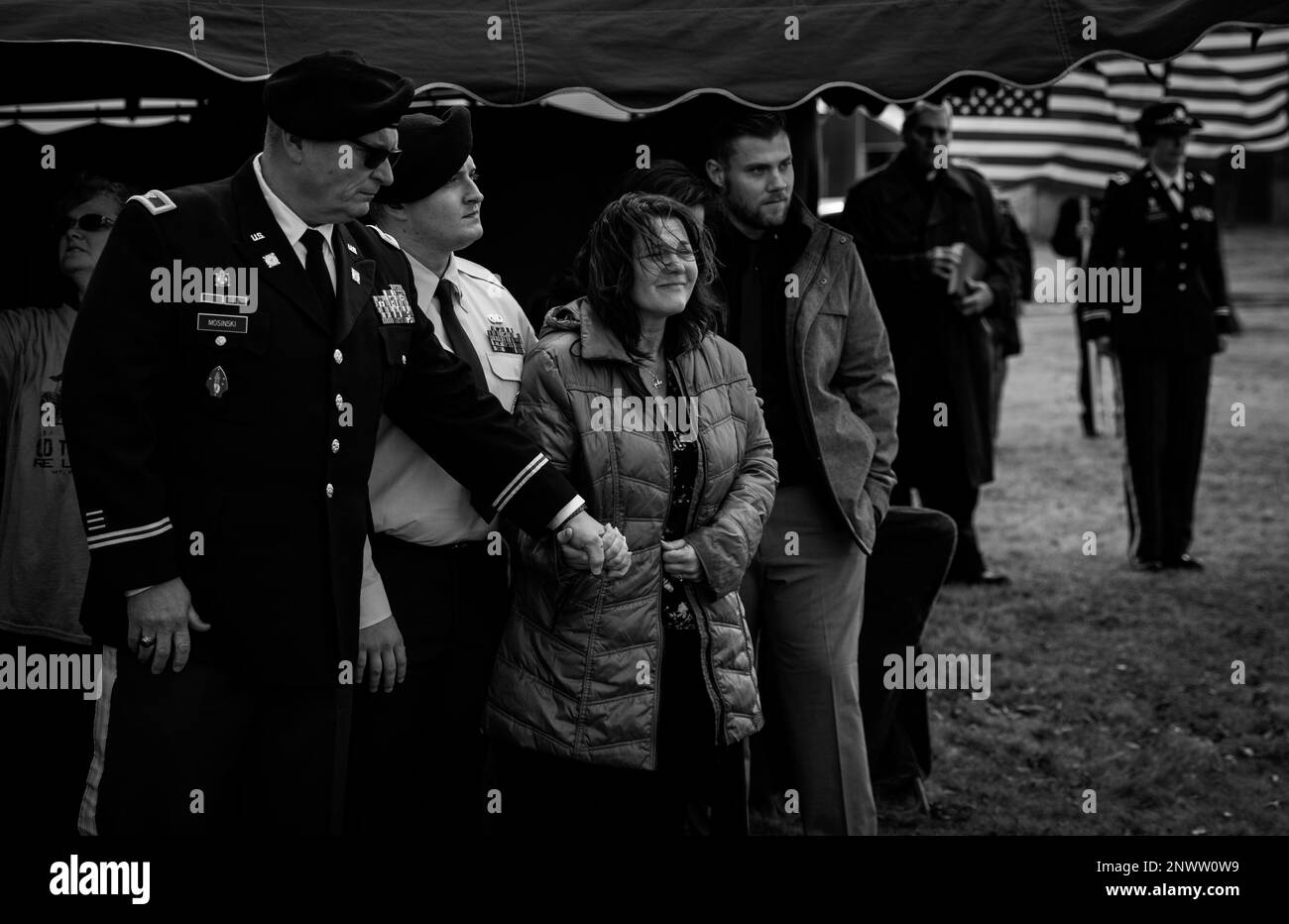 Col. Donald Mosinski, Iowa Army National Guard, comforts Josie Mosinski