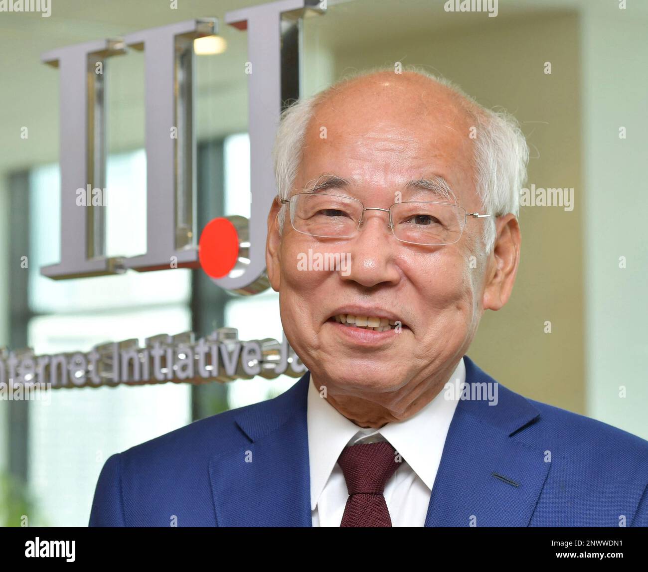 IIJ (Internet Initiative Japan Inc.) President Koichi Suzuki poses