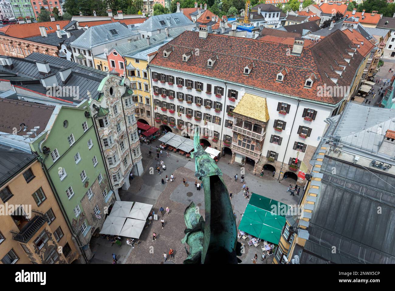 INNSBRUCK, AUSTRIA – JULY 30, 2022: Views of the Golden Roof and the Helbling House from the City Tower Stock Photo