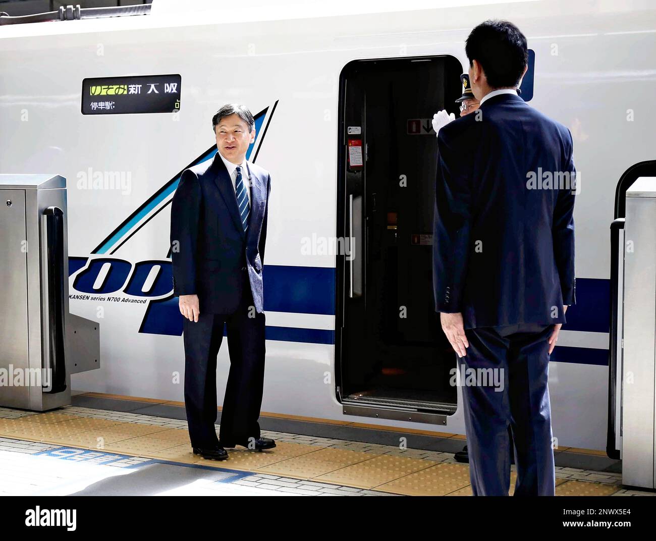 Japan's Crown Prince Naruhito boards a Shinkansen (bullet train) to go to Mie Prefecture to visit Ise Grand Shrine at JR Tokyo Station in Tokyo on July 31, 2018. ( The Yomiuri Shimbun via AP Images ) Stock Photo