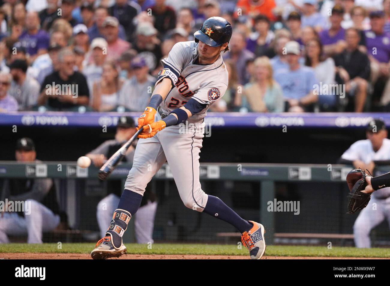 Houston Astros right fielder Josh Reddick (22) swings at the pitch in a