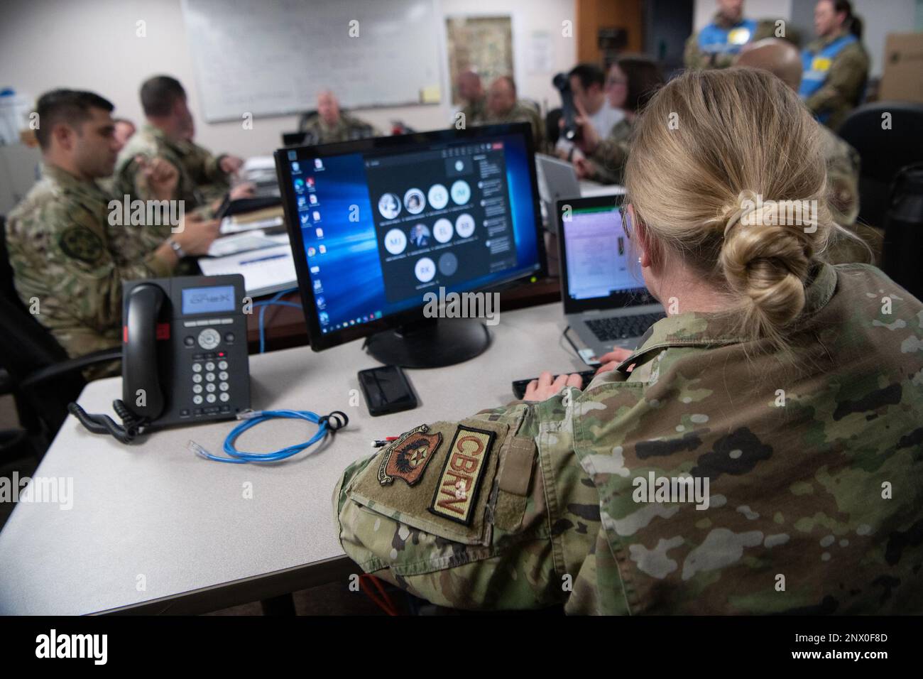 U.S. Air Force Staff Sgt. Ashley White, emergency manager with the 137th Civil Engineer Squadron, inputs information in to the Emergency Operations Center event tracker during a tornado major accident response exercise at Will Rogers Air National Guard Base, Oklahoma City, Feb. 8, 2023. Airmen with the 137th Special Operations Wing worked alongside first responders from Oklahoma City agencies during the scenario to exercise their mutual tactics, techniques and procedures like they would if providing mutual aid in a real response. Stock Photo