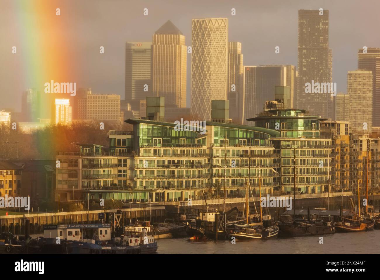 England, London, Docklands, Canary Wharf Skyline and Rainbow Stock Photo