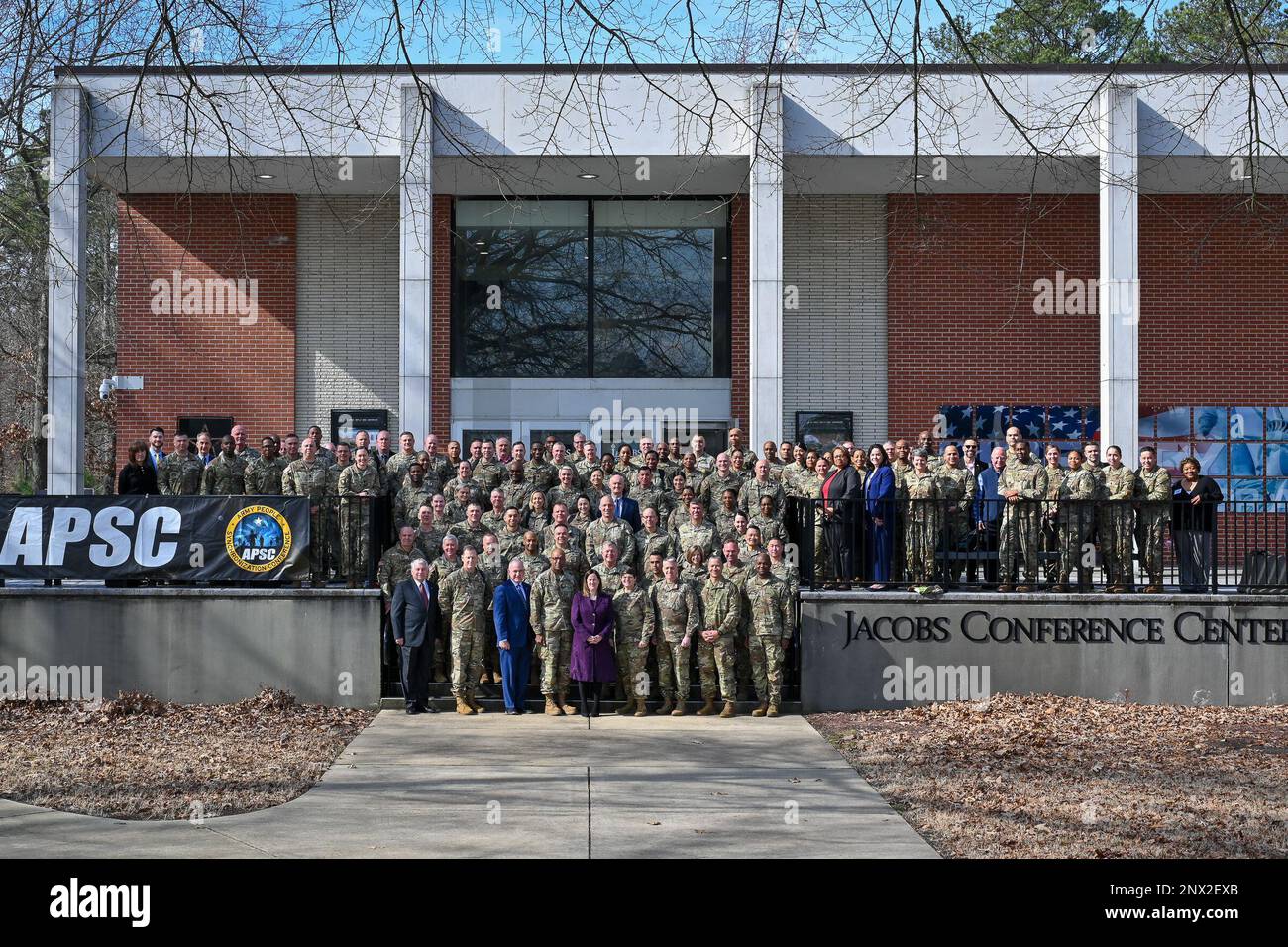 Senior leaders and attendees pose for group photo after the Army People