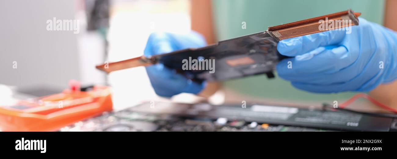 Technical engineer is working on computer motherboard Stock Photo - Alamy