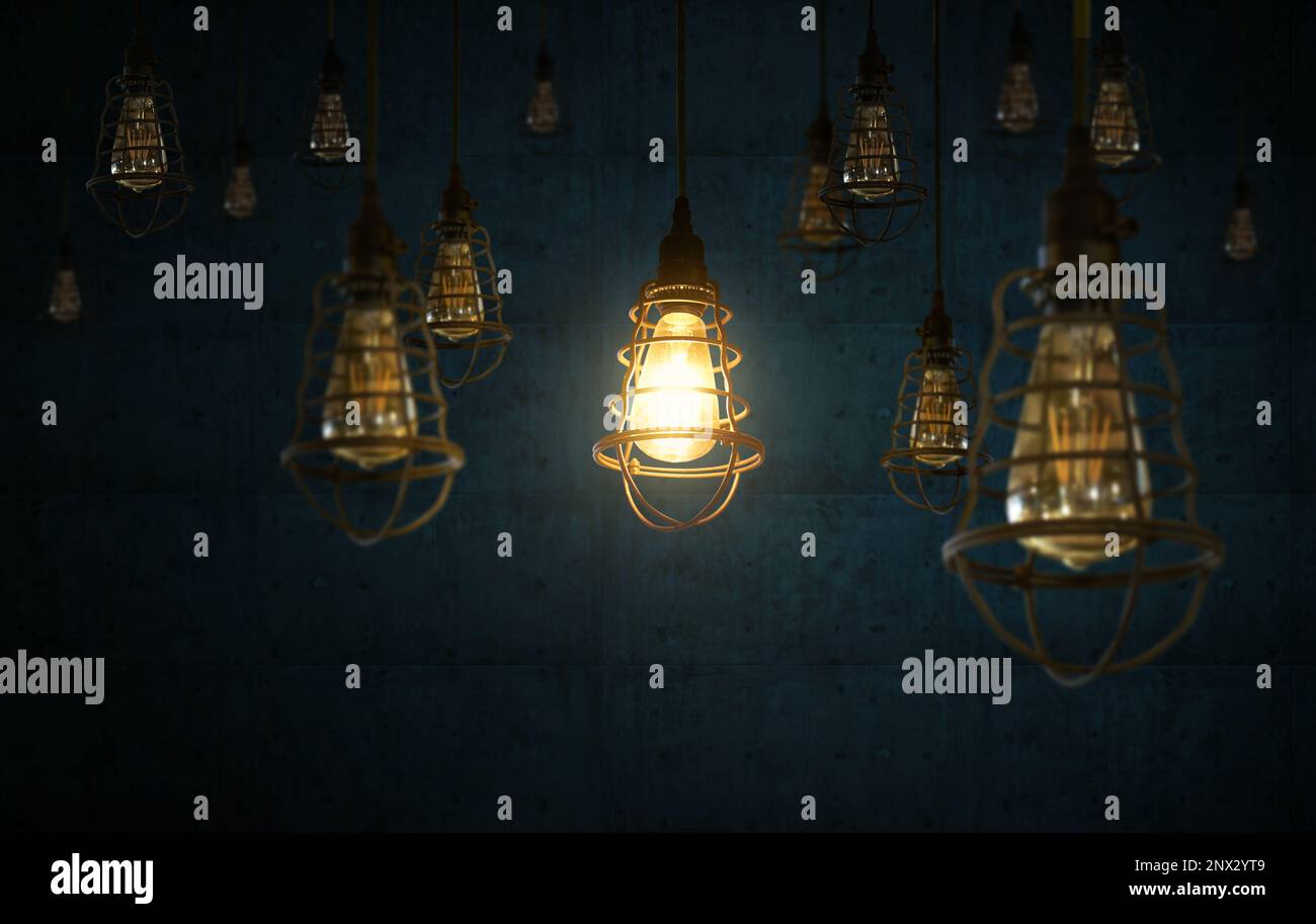Light Bulbs on dark background. Creative idea concept Stock Photo