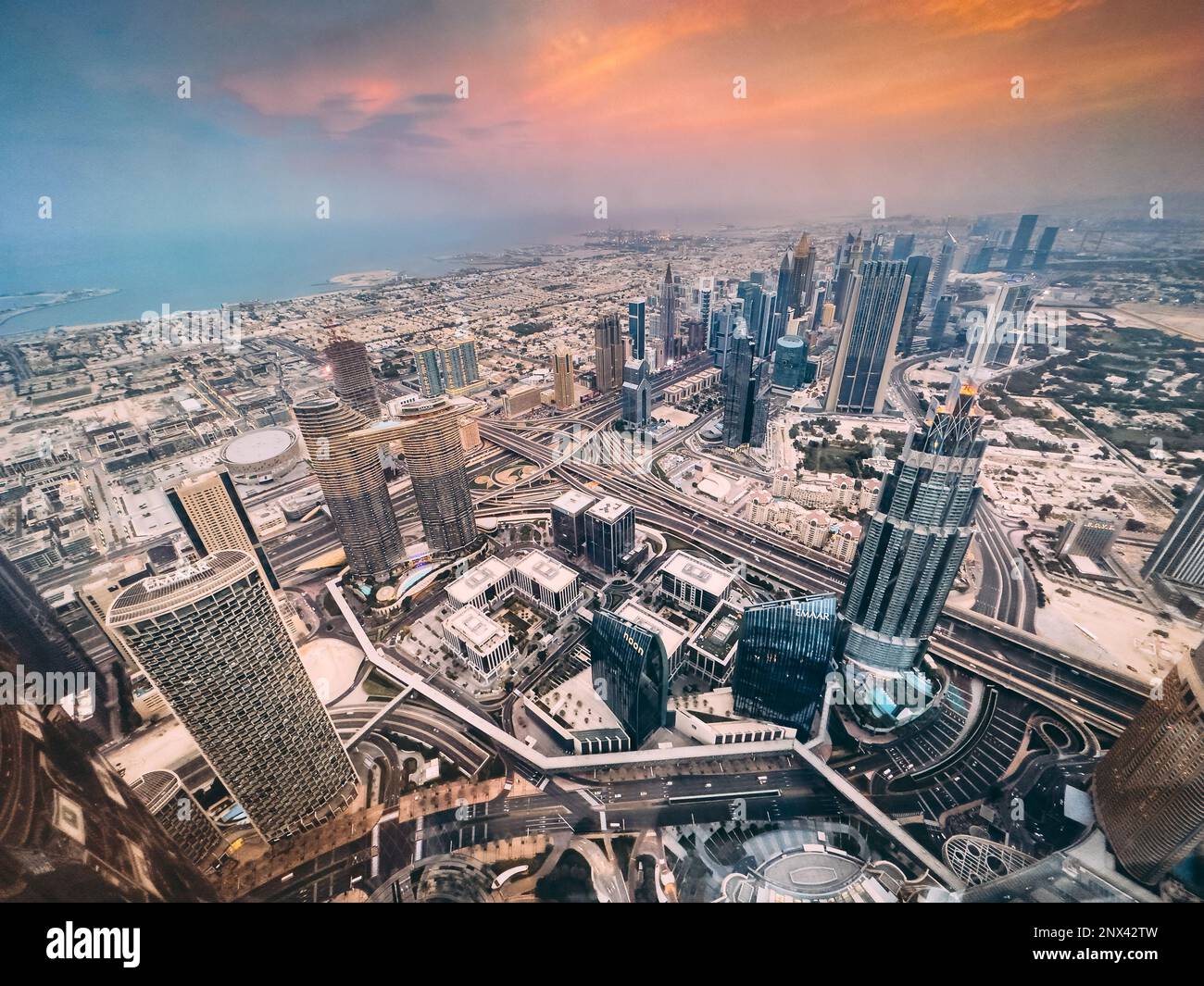 Aerial view of Downtown Dubai with roads, Dubai Mall and the fountain ...