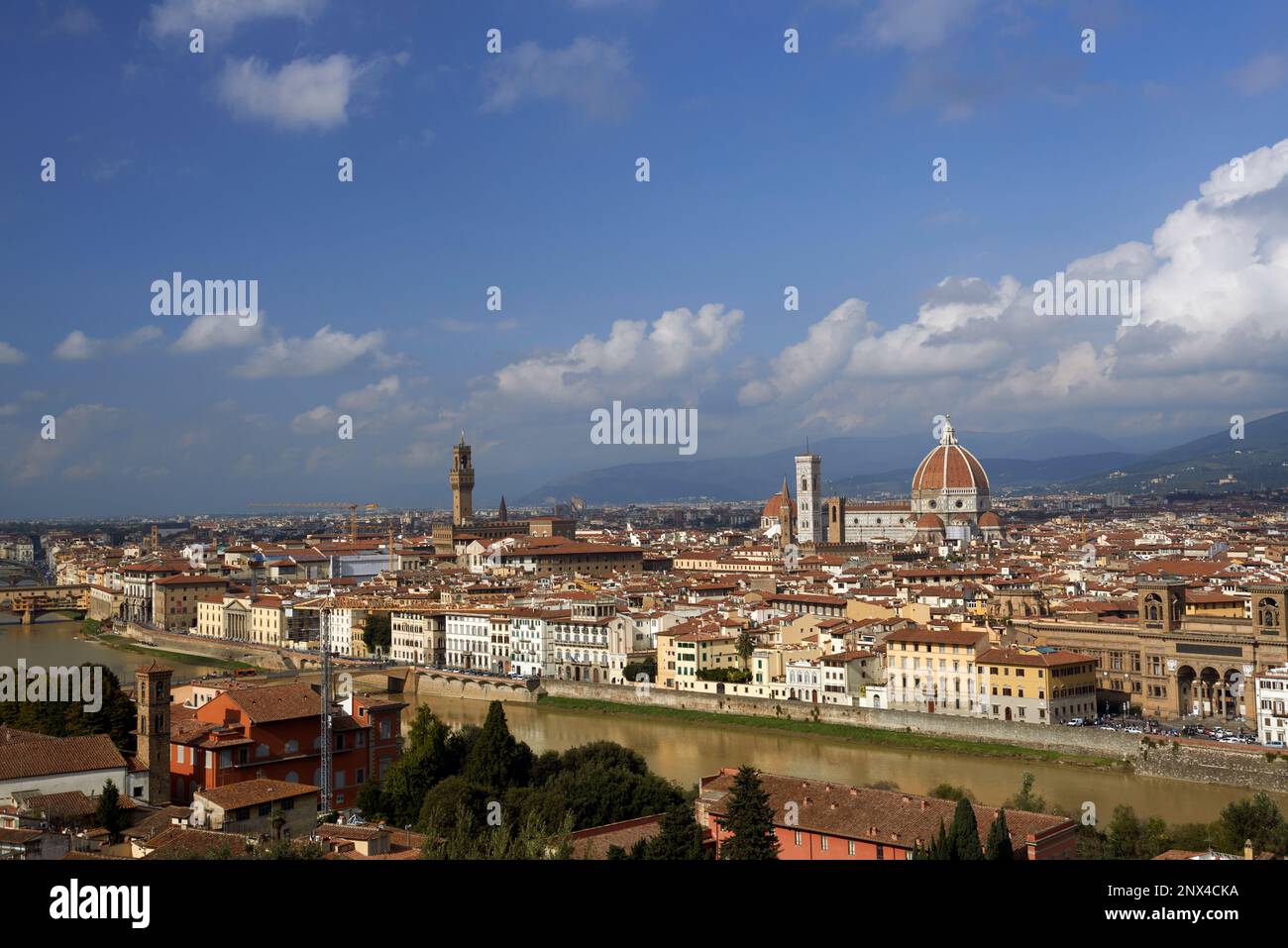 The view from Piazzale Michelangelo over to the historic city of Florence The dome of Basilica di Santa Maria del Fiore otherwise known as the Duomo Stock Photo