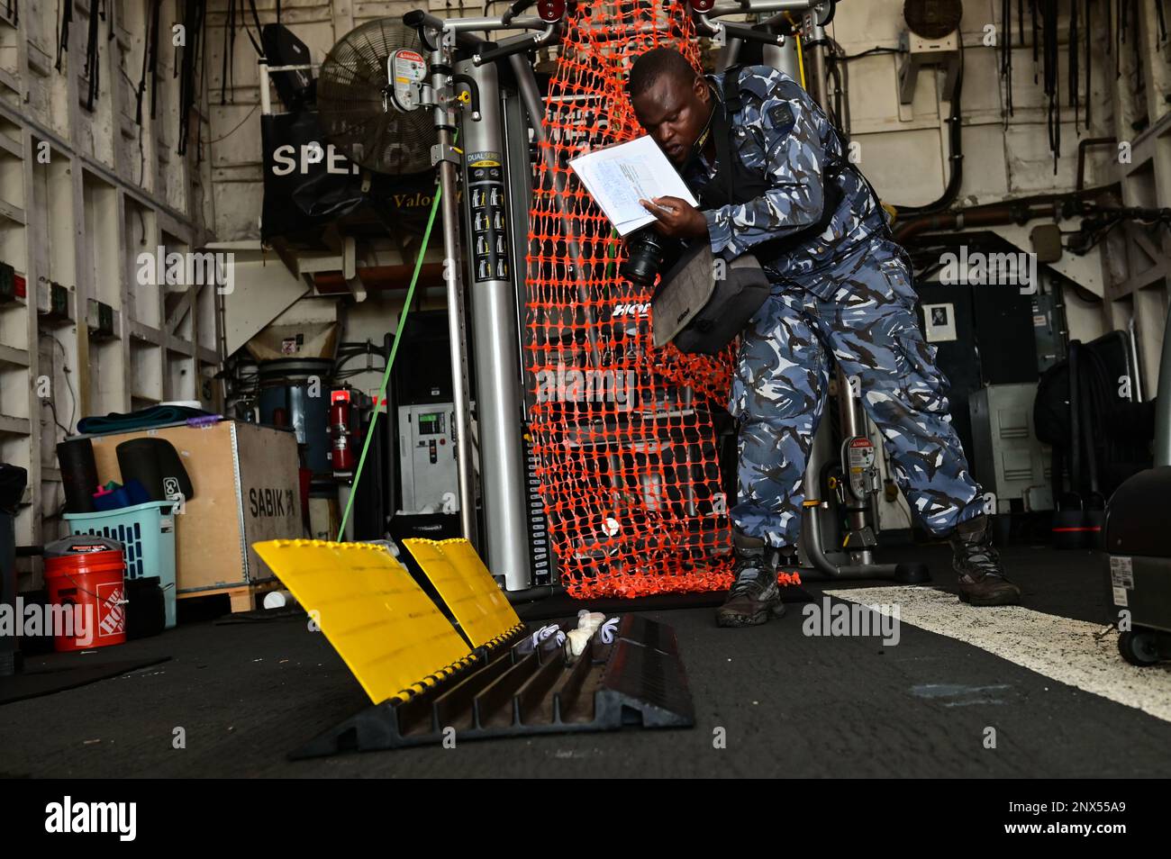 A Benin Navy sailor conducts law enforcement training aboard USCGC Spencer  (WMEC 905) as part of Obangame Express 23 in the Atlantic Ocean, Jan. 30,  2023. Obangame Express 2023, conducted by .