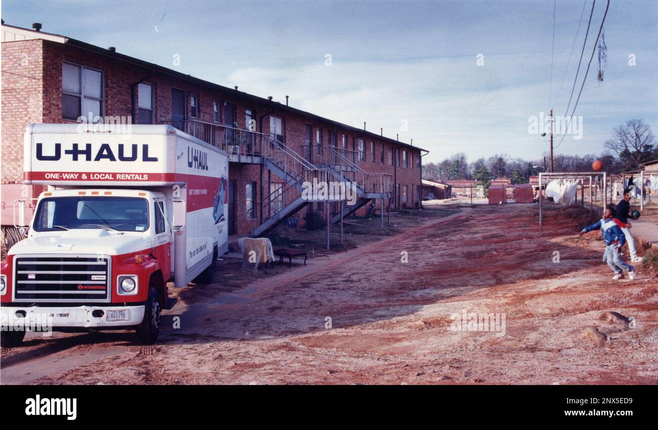 A moving van in front of an East Lake Meadows apartment, Dec. 22