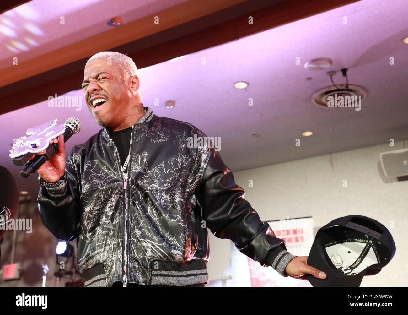 Dru Hill member Sisqó sings a song during the group’s concert Jan. 10 at the Camp Zama Community Club at Camp Zama, Japan. The group was in Japan as part of a tour of U.S. military bases in Asia in conjunction with Armed Forces Entertainment. Stock Photo