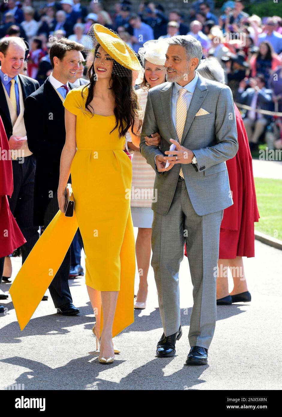 Amal and George Clooney arrive for the wedding ceremony of Prince Harry ...