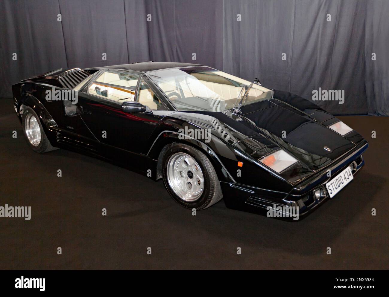 Studio Shot of a Black, Lamborghini Countach on the art of cars stand,  at the 2023 London Classic Car Show Stock Photo