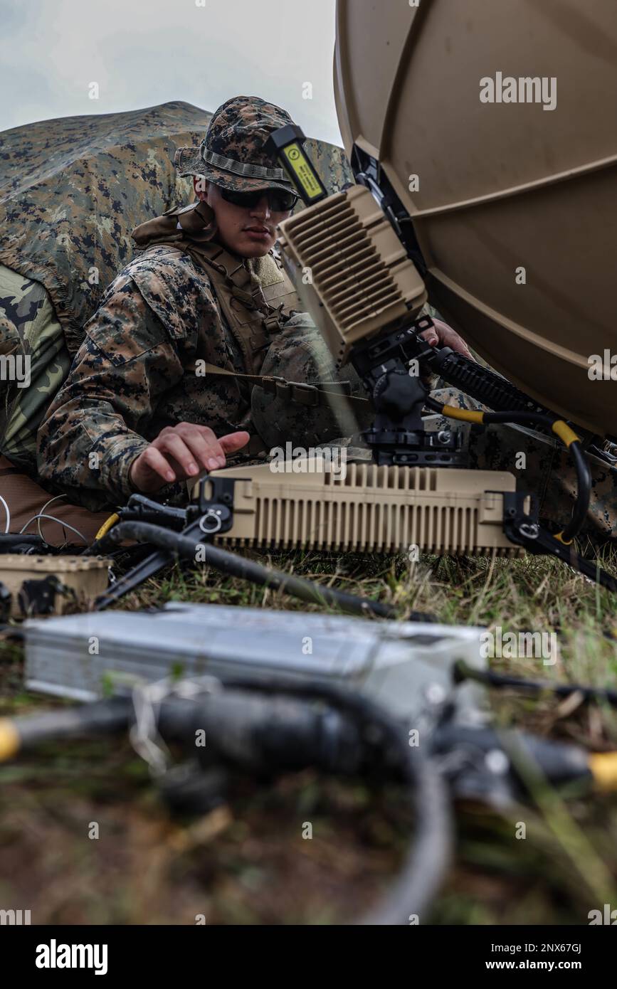 U.S. Marine Corps Lance Cpl. Ian James Lang, a satellite transmission