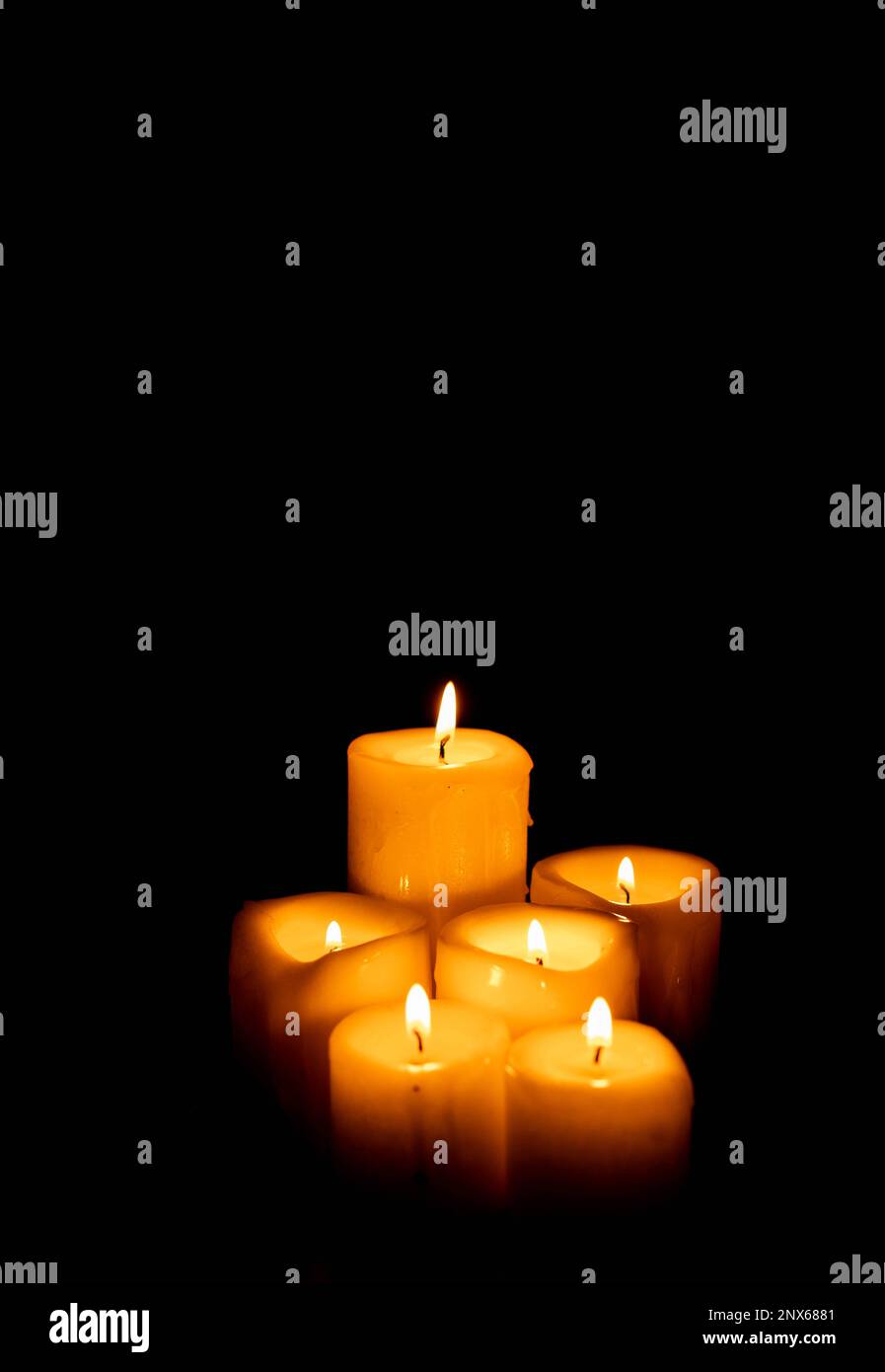 Set of candles on a black background with copy space. Holy Week, Good