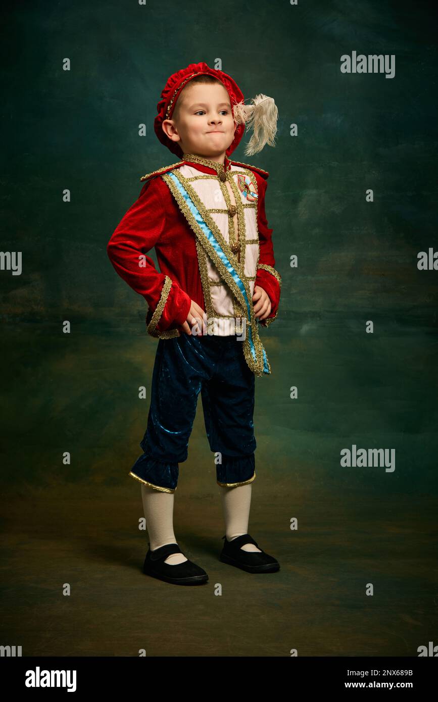 Black and white portrait of little boy dressed up as medieval character