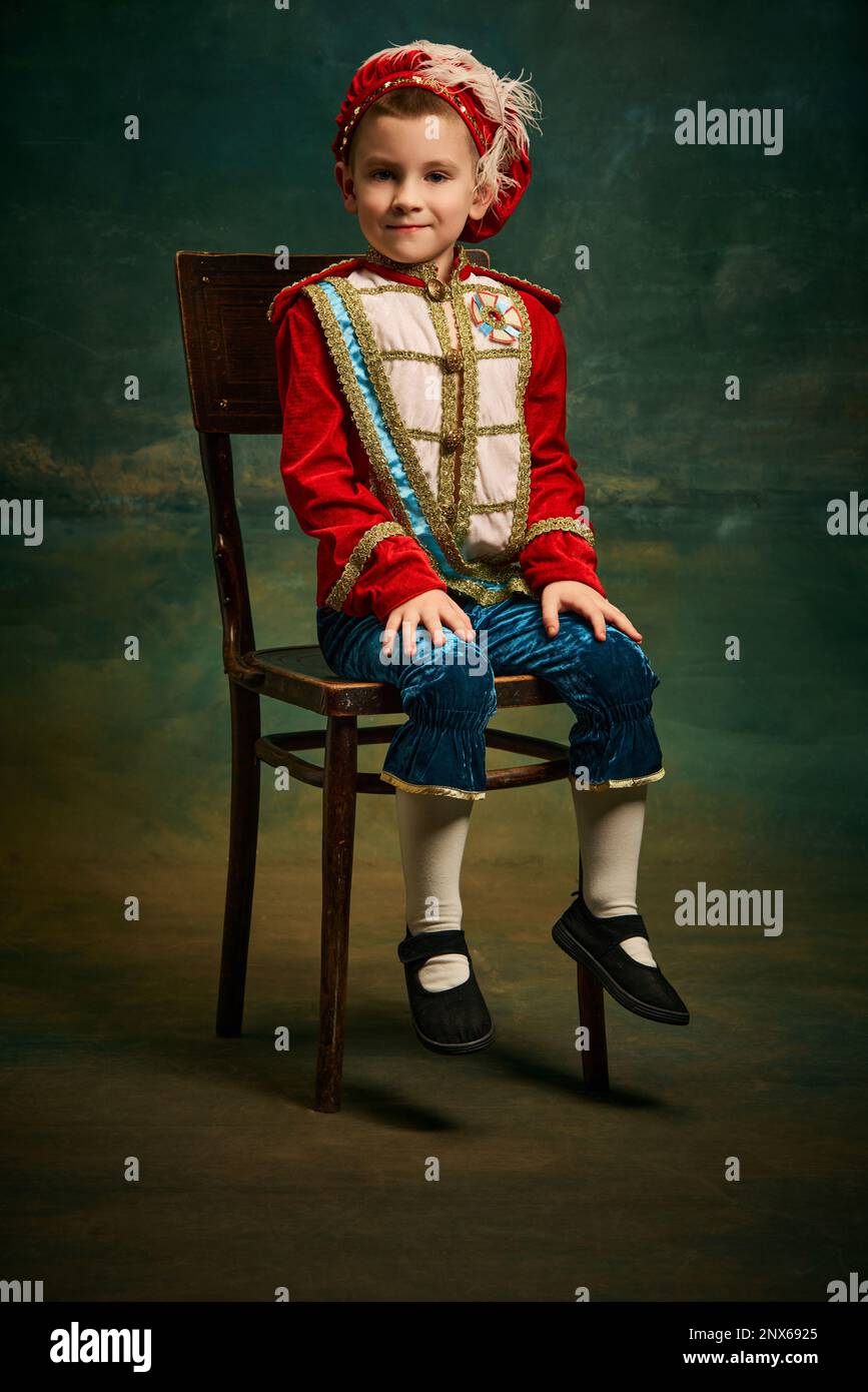 Portrait of cute little boy dressed up as medieval character, little
