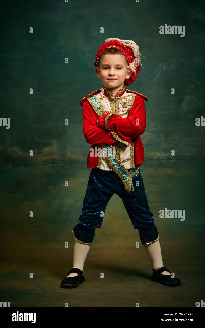 Portrait of cute little boy dressed up as medieval character, little