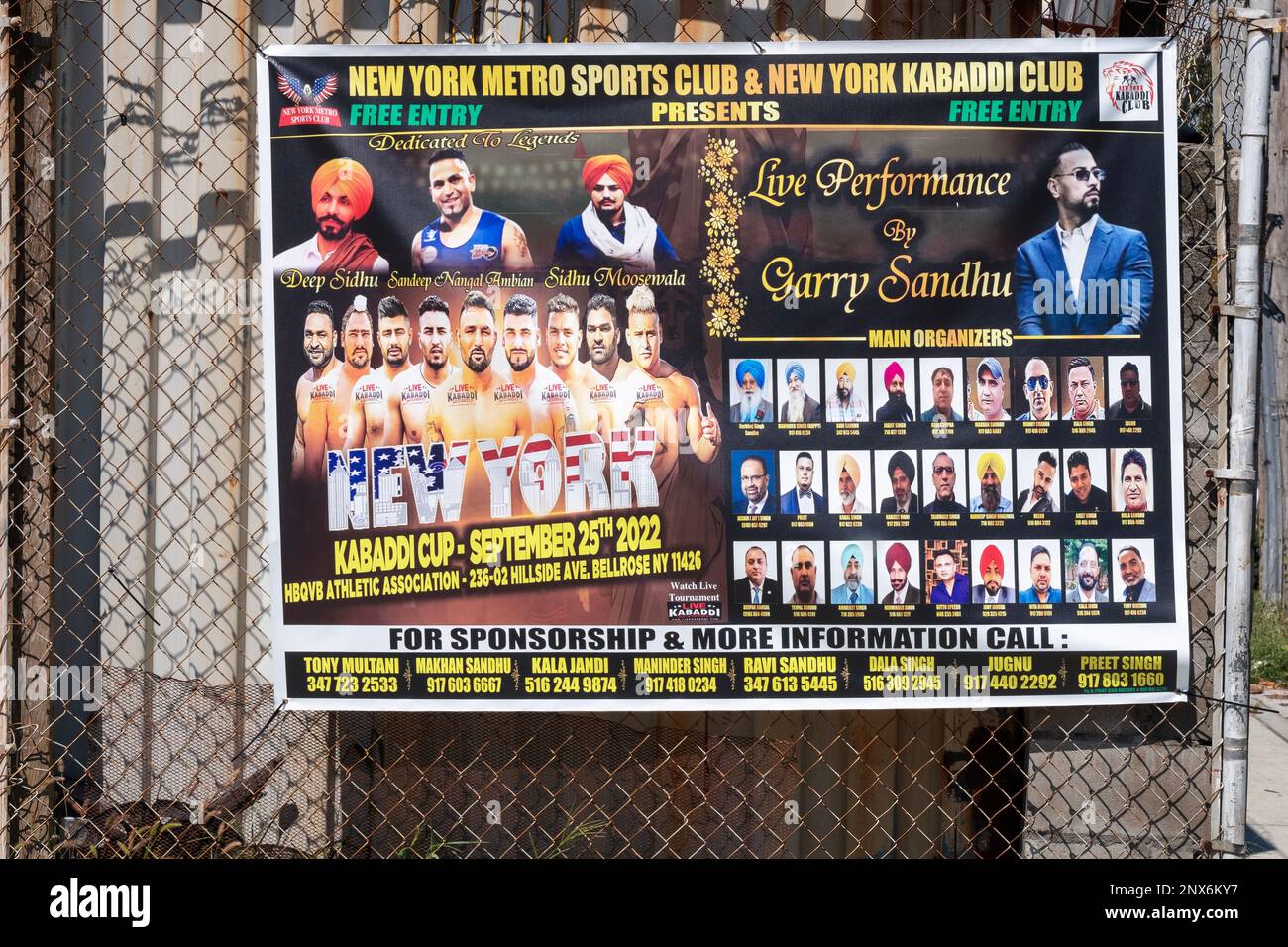 Sign advertising Kabaddi matches & concert events for the Sikh & South Asian communities living in Ozone Park and Richmond Hill, Queens, New York City Stock Photo