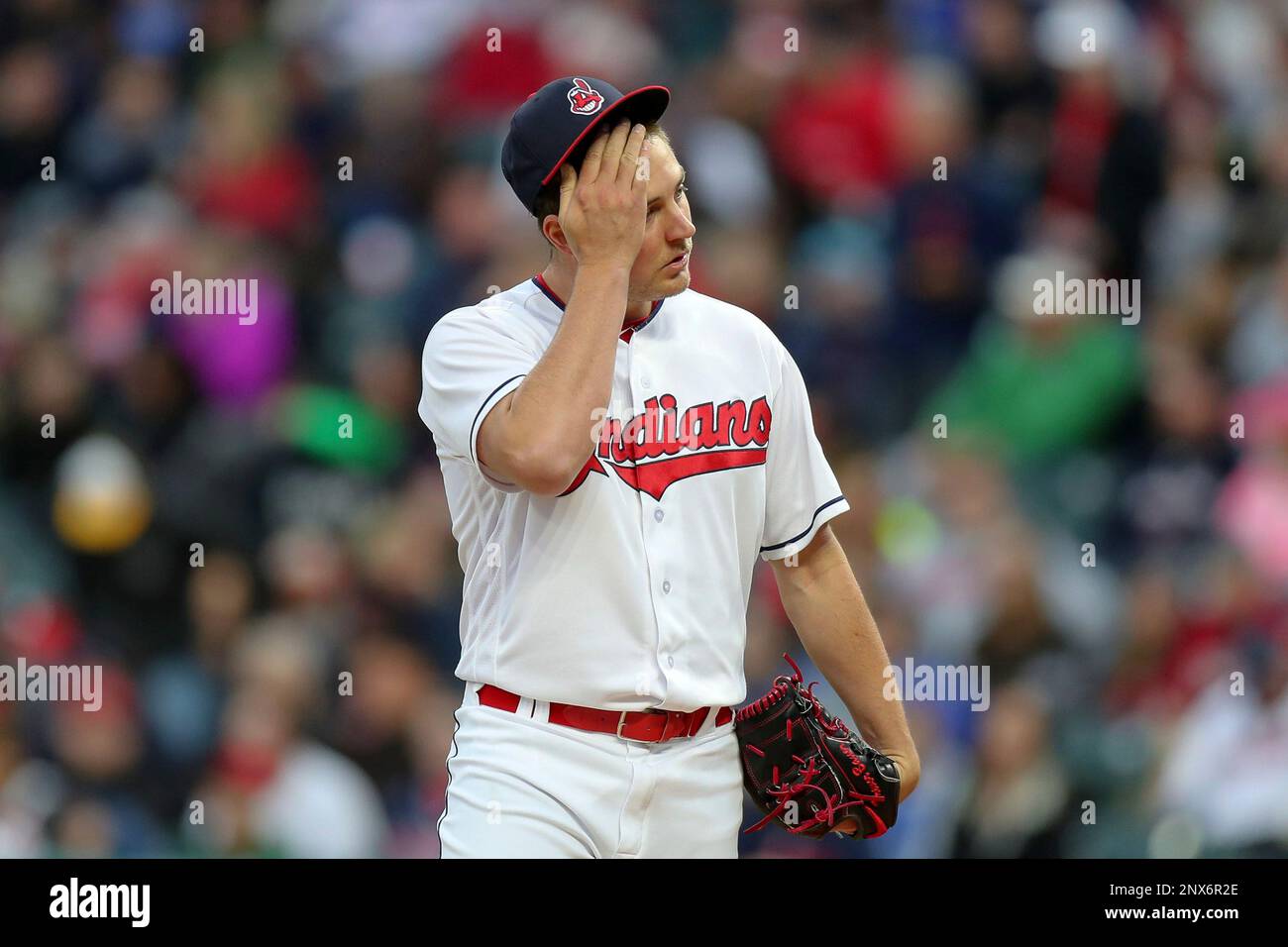 CLEVELAND, OH - MAY 11: Cleveland Indians Pitching Coach Carl Willis (51)  reacts after meets with Cleveland Indians starting pitcher issuing a walk  with the bases loaded to force in a run
