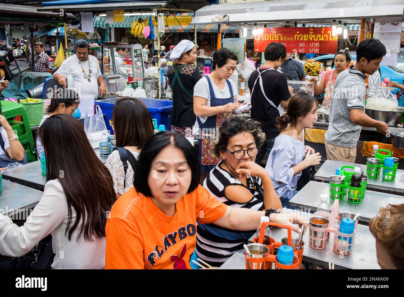 People waiting the dish order, Street food market, at Itsara nuphap