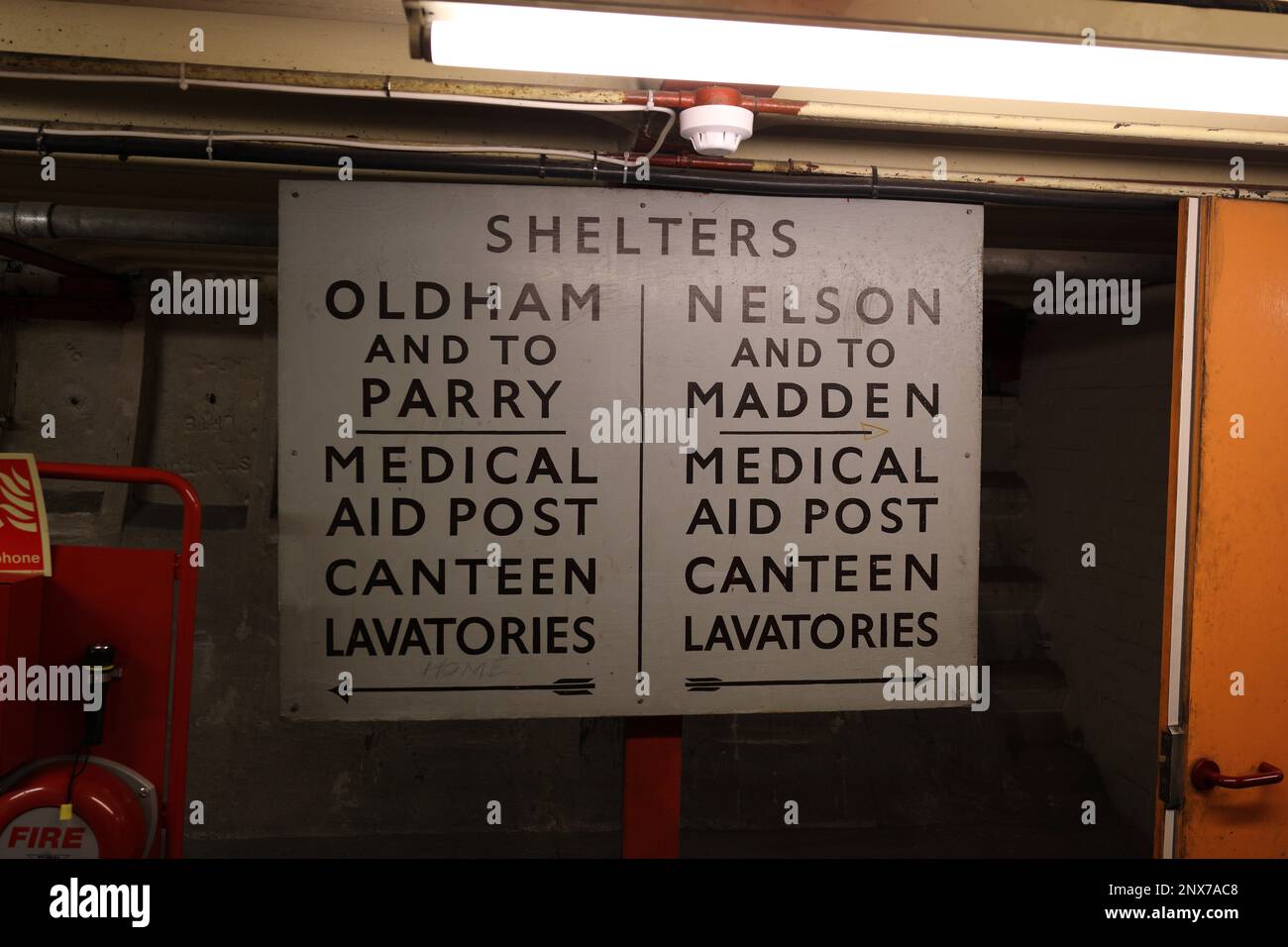 London, England, UK - Sign to shelters and facilities in tunnel of Clapham South Deep-Level Shelter built in World War II as air-raid shelter Stock Photo