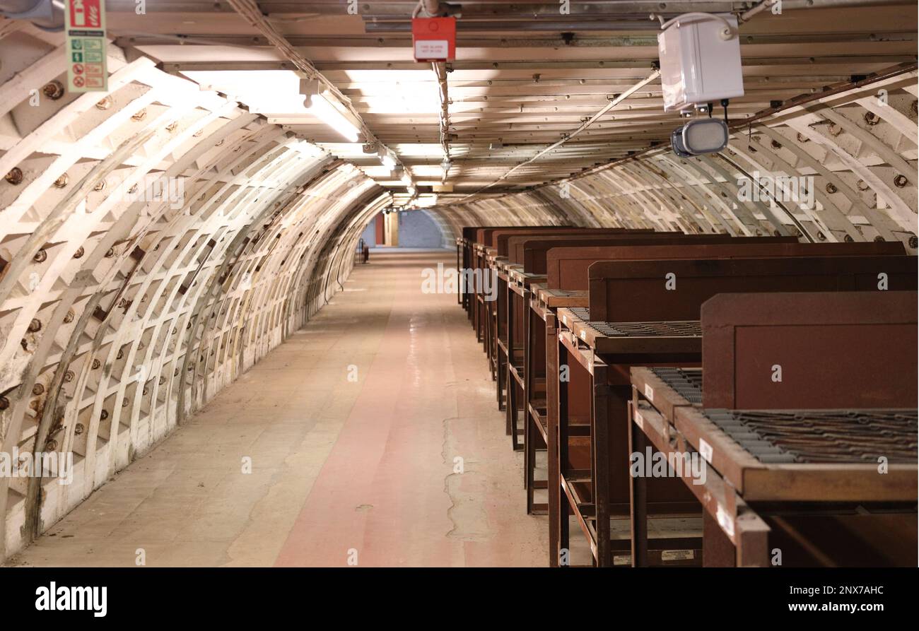 London, England, UK - Three tiered bunk beds in sleeping accommodation of Clapham South Deep-Level Shelter built in World War II as air-raid shelter Stock Photo