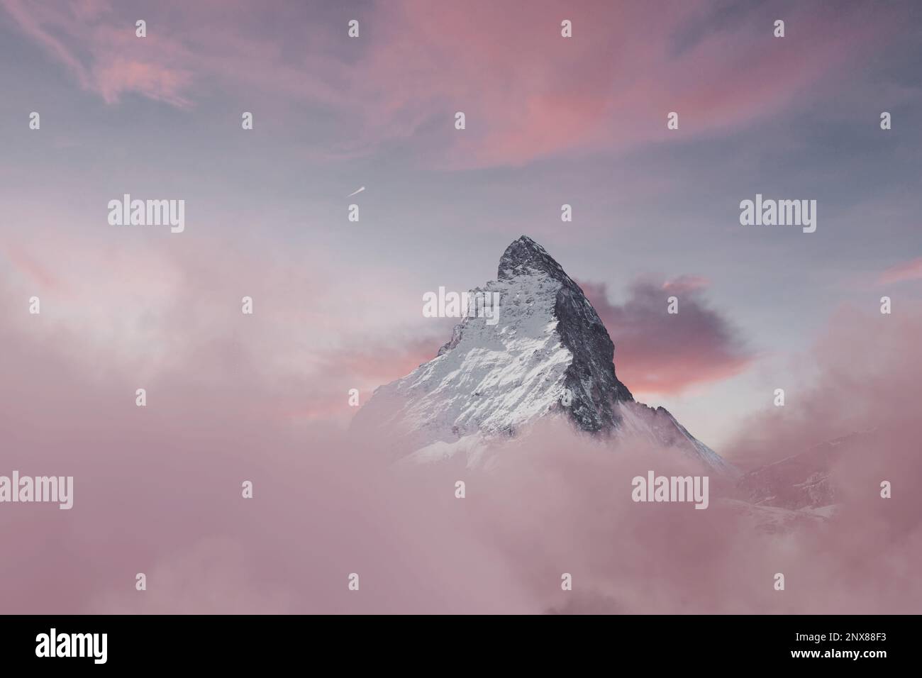 view to the majestic Matterhorn mountain in the evening pink mood Stock Photo