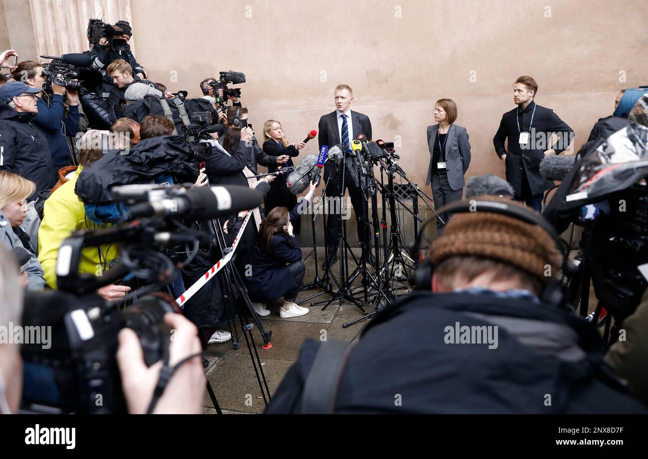 Prosecutor Jakob BuchJepsen, center, at a press briefing in front of