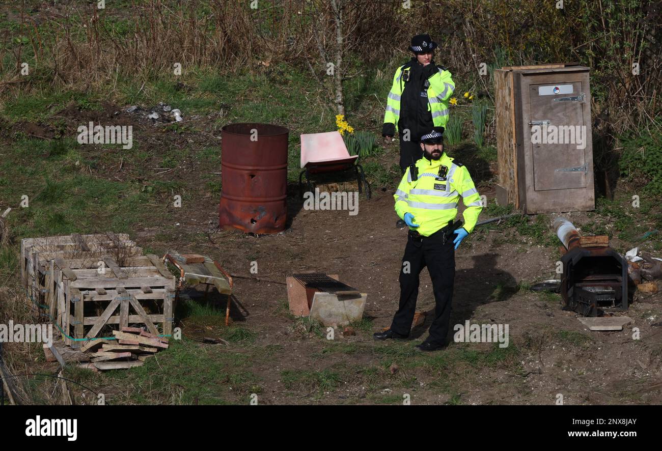 Police searching allotments for baby Victoria Marten after the arrest of her mother Constance Marten and her partner Mark Gordon. Police officers and Crime Scene investigators were seen looking into a brazier oil drum on the site of a camp within the allotments. The body of Victoria was found a day later hidden wrapped in a plastic bag in a nearby shed. Picture by James Boardman Stock Photo