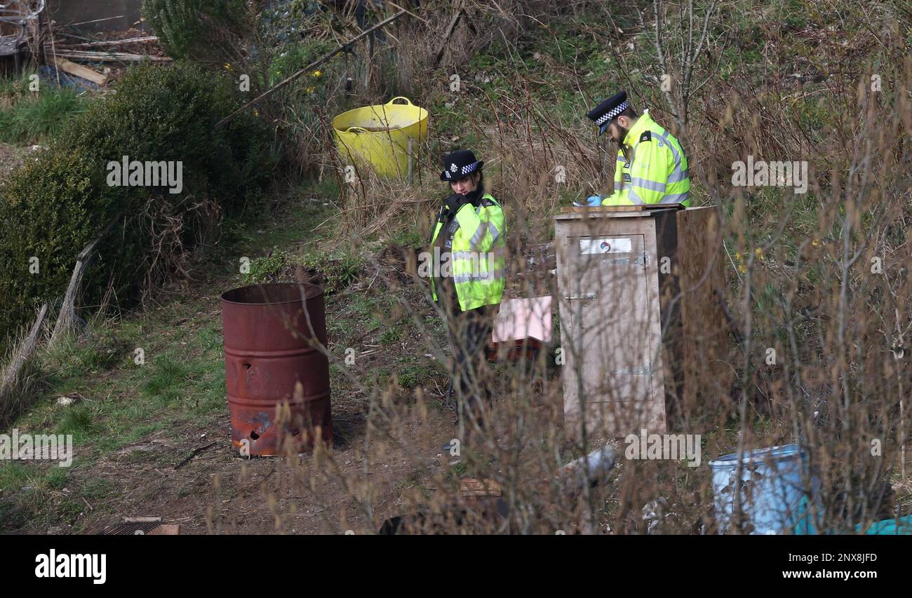 Police searching allotments for baby Victoria Marten after the arrest of her mother Constance Marten and her partner Mark Gordon. Police officers and Crime Scene investigators were seen looking into a brazier oil drum on the site of a camp within the allotments. The body of Victoria was found a day later hidden wrapped in a plastic bag in a nearby shed. Picture by James Boardman Stock Photo