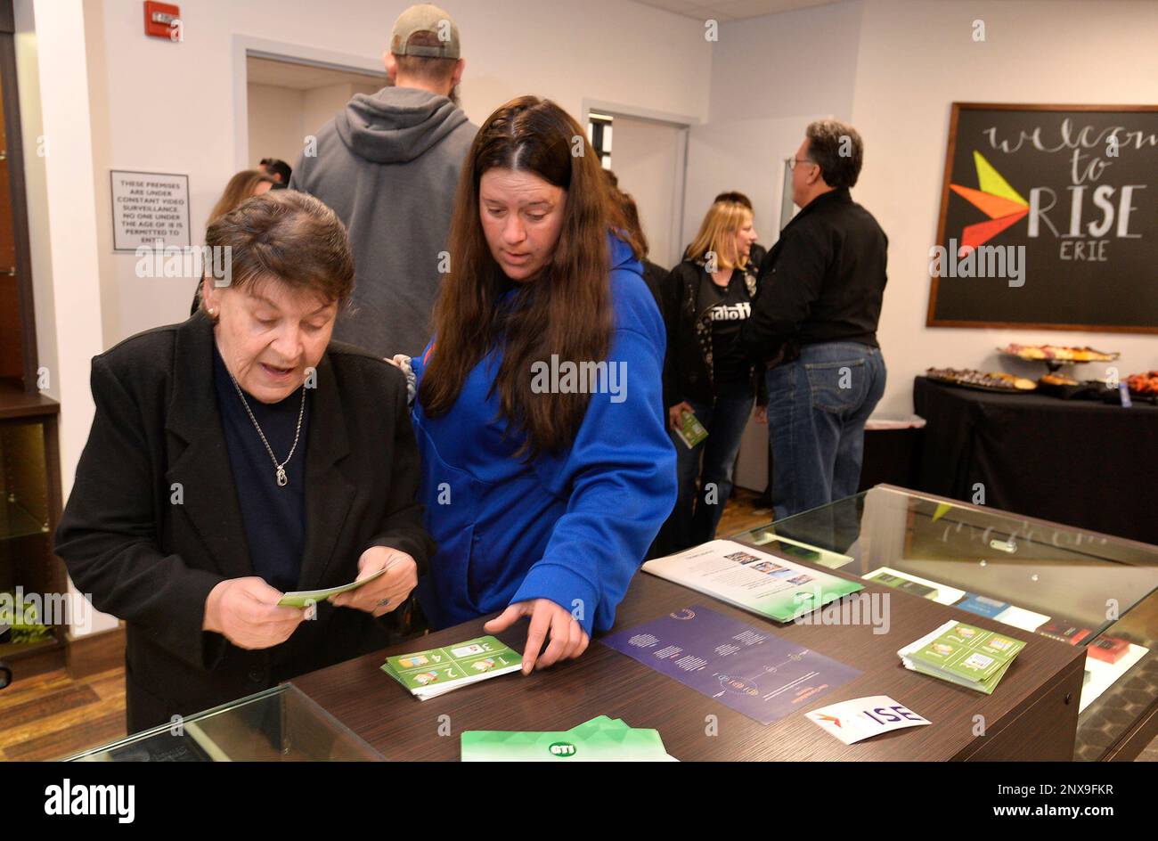 Diane Walters, left, and her caregiver Tasha Zirkle look over free